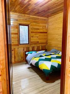 Ένα ή περισσότερα κρεβάτια σε δωμάτιο στο Gôn Home