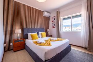 Postel nebo postele na pokoji v ubytování Casa Areal de Santa Barbara
