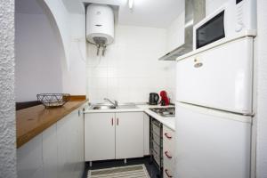 Kuchnia lub aneks kuchenny w obiekcie ALEGRIA ID14