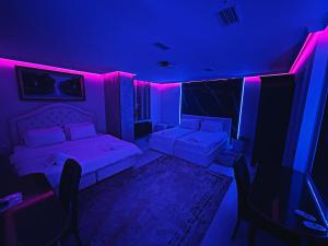Postel nebo postele na pokoji v ubytování Hotel Rosa Blu