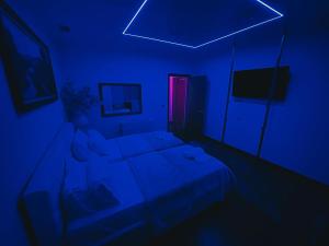 TV a/nebo společenská místnost v ubytování Hotel Rosa Blu