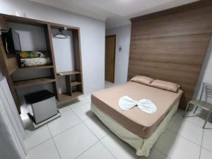 Postel nebo postele na pokoji v ubytování Hotel Vitória - Guaíra