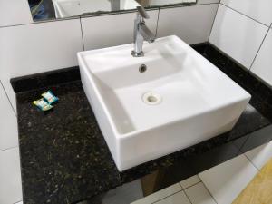 Koupelna v ubytování Hotel Vitória - Guaíra