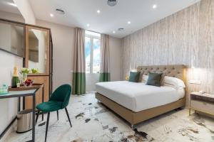 Postel nebo postele na pokoji v ubytování 69 Suite Boutique + 37 fotografií