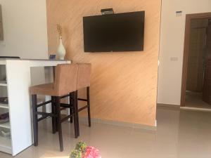 A television and/or entertainment centre at Apartments MASIMO