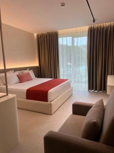 Letto o letti in una camera di Hotel Skanderbeg