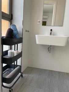 Ένα μπάνιο στο Apartamento en Alcalá de Guadaíra