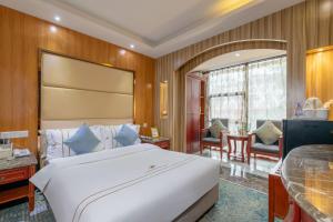 Postel nebo postele na pokoji v ubytování Cavalier Hotel Chongqing