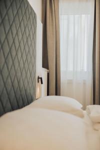 Voodi või voodid majutusasutuse Feichter Hotel & Bistro toas