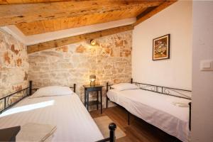 Ένα ή περισσότερα κρεβάτια σε δωμάτιο στο Apartment Valerija