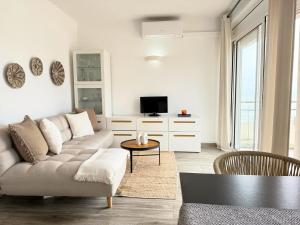 TV a/nebo společenská místnost v ubytování Atico frente al mar!