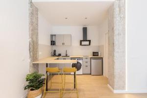 Η κουζίνα ή μικρή κουζίνα στο Cozy & Stylish APT,Santa Bárbara Castle,Wifi,AC