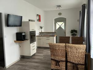 Kuchyň nebo kuchyňský kout v ubytování Appartement Radwerk 14 + 14 fotografií