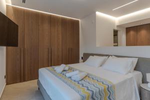 Ένα ή περισσότερα κρεβάτια σε δωμάτιο στο Casadi Luxury Villa +42 φωτογραφίες