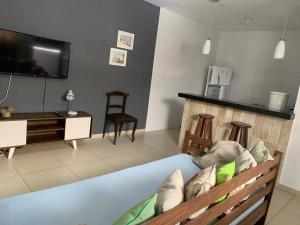 TV a/nebo společenská místnost v ubytování Aloha Beach Temporada