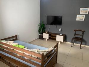 TV a/nebo společenská místnost v ubytování Aloha Beach Temporada