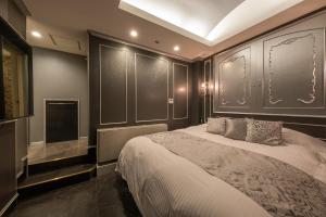 Katil atau katil-katil dalam bilik di ホテル 兆 各務原店 Hotel CHO Kakamigahara