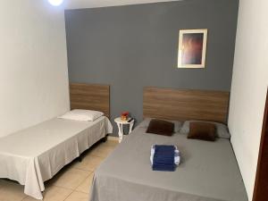Postel nebo postele na pokoji v ubytování Aloha Beach Temporada