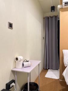 a room with a white table and a curtain at Chubby 5 in Bang O +12 photos