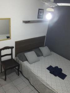 Postel nebo postele na pokoji v ubytování Aloha Beach Temporada