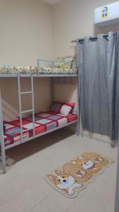 Postel nebo postele na pokoji v ubytování Gulf Gateway Hostel