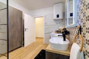 Køkken eller tekøkken på Apartman Mia + 62 billeder