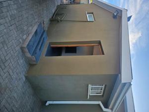 an overhead view of a building with a staircase at Longe De Casa in Colesberg +4 photos