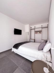 Postel nebo postele na pokoji v ubytování Hotel Vienna