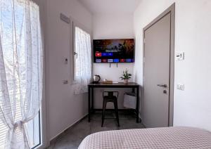 TV a/nebo společenská místnost v ubytování Hotel Vienna