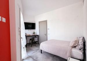 Postel nebo postele na pokoji v ubytování Hotel Vienna