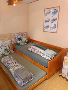 a room with two bunk beds in it at Cabanon du Pêcheur, Parc National des Calanques in Marseille