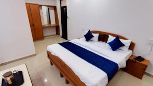 Postel nebo postele na pokoji v ubytování Hotel Eleven Elites