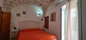 A bed or beds in a room at Il Rifugio Sul Mare