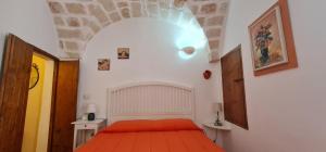 A bed or beds in a room at Il Rifugio Sul Mare