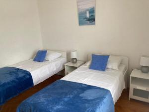Postel nebo postele na pokoji v ubytování Apartment L&K