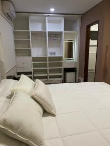 Postel nebo postele na pokoji v ubytování Casa a minutos del Aeropuerto
