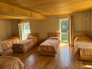 Voodi või voodid majutusasutuse Raja Hotel Fierze toas