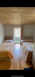 Voodi või voodid majutusasutuse Raja Hotel Fierze toas