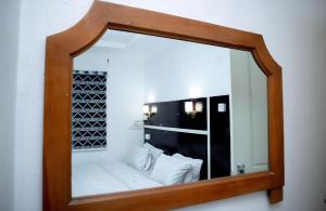 Katil atau katil-katil dalam bilik di Option one hotel and suite +4 gambar