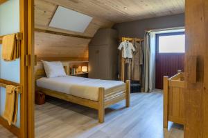 Postel nebo postele na pokoji v ubytování Holiday Home 't Hof der Witte Damen