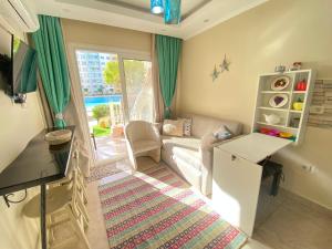 a living room with a couch and a table at Apartment in El Alamein,Sia Lagoon,Golf porto marina in El Alamein