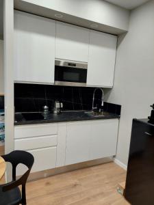 Kuchyň nebo kuchyňský kout v ubytování Casa San Carlo 11 + 8 fotografií