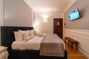 Letto o letti in una camera di Tesoretto Hotel