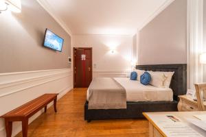 Letto o letti in una camera di Tesoretto Hotel