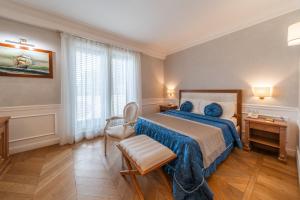 Letto o letti in una camera di Tesoretto Hotel