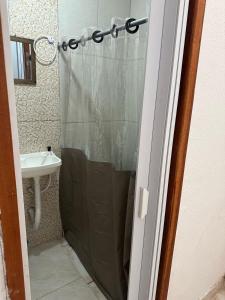 a bathroom with a shower and a sink at Pousada Laviê Morada de Leste in Pontal do Paraná +22 photos