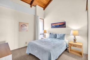 a bedroom with a bed and a window at Maui Vista 1411 in Kihei +19 photos