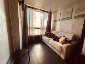 En eller flere senge i et værelse på Paris 4U