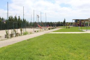 Aed väljaspool majutusasutust Ferme d'hôte Evasio