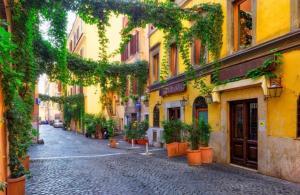 a cobblestone street in a city with buildings at CASA PANIERI in Rome